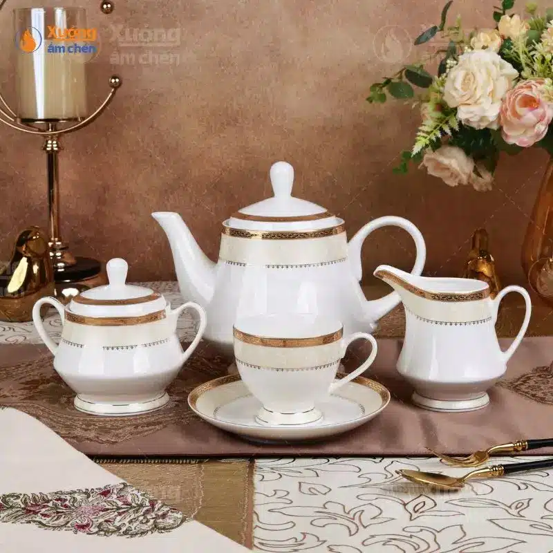 Bộ ấm chén uống trà dát vàng men trắng